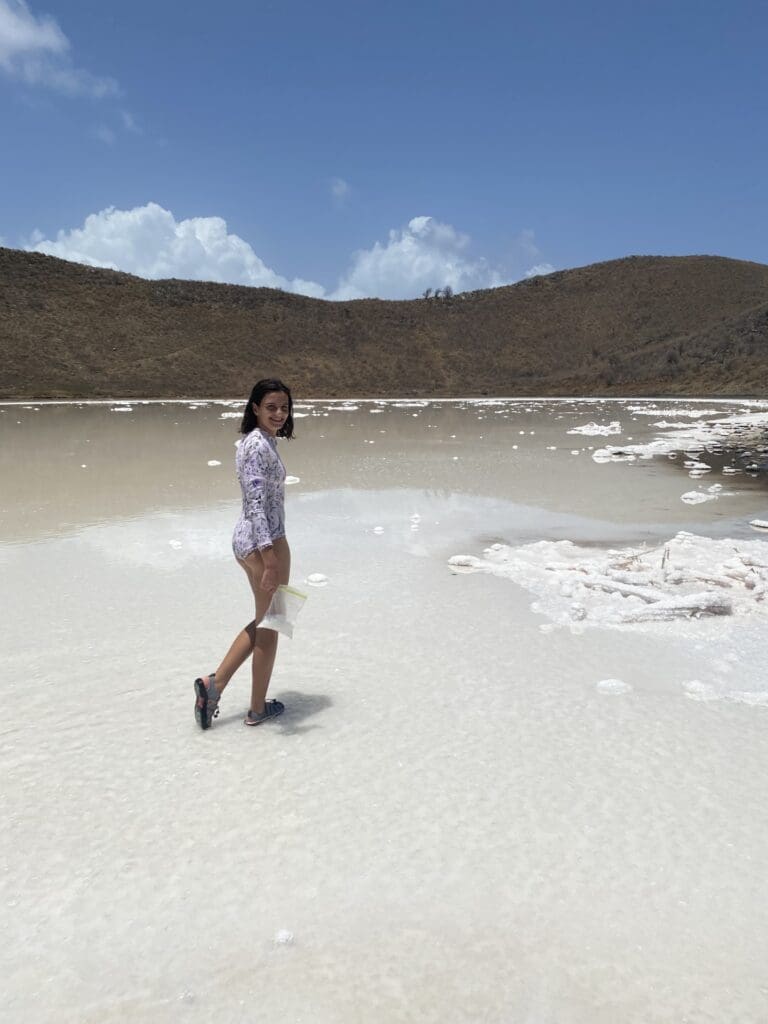 Young Girl Playing In The Salt Ponds